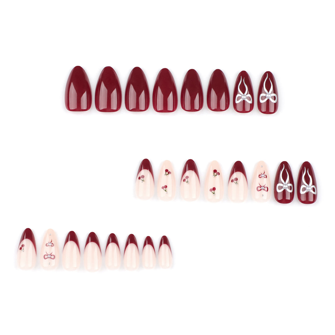 Glamorous stiletto nails with delicate accents Bowlift