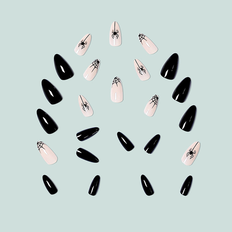 Artistic nail art with spider motif Bowlift
