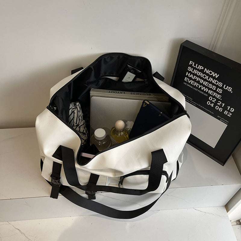 Robust Sports and Travel Bag with Versatile Compartment Design Bowlift
