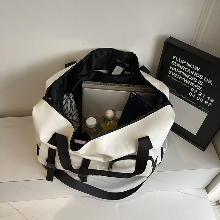 Robust Sports and Travel Bag with Versatile Compartment Design Bowlift