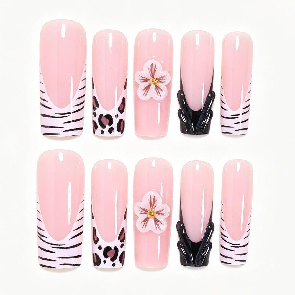 Artistic Press-On Nail Art Tips with Floral and Animal Print Designs Bowlift