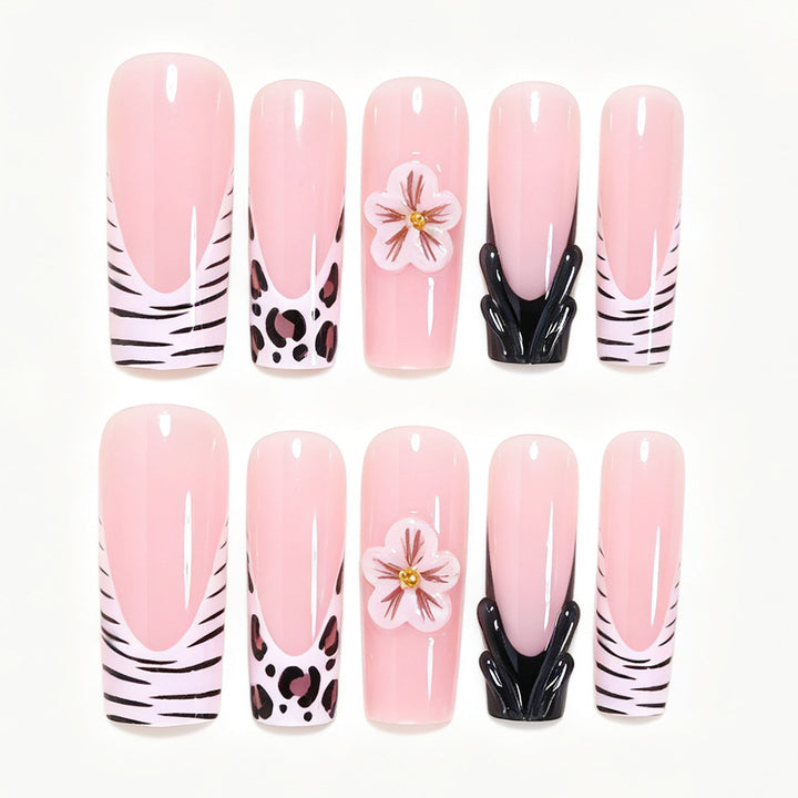 Artistic Press-On Nail Art Tips with Floral and Animal Print Designs Bowlift