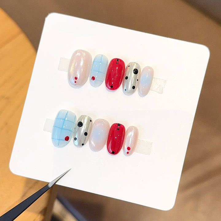 Artificials nails with creative geometric design and modern accents Bowlift