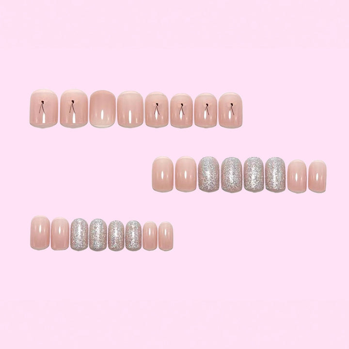 Artificial nails with sparkling accents and floral design Bowlift