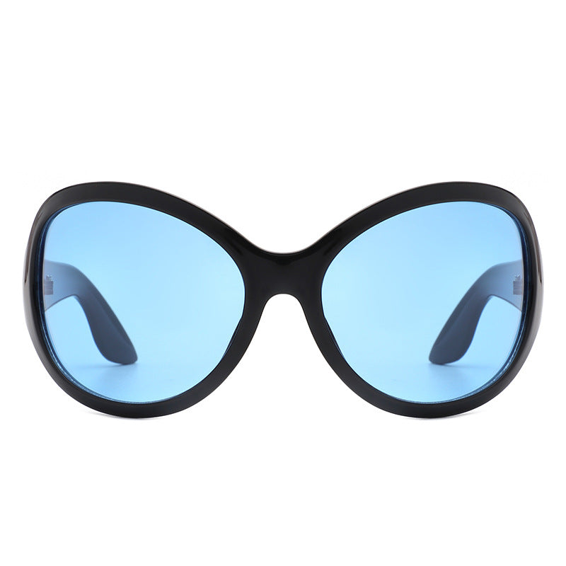 Ladies sunglasses in a stylish butterfly design with UV protection and wide frame Bowlift