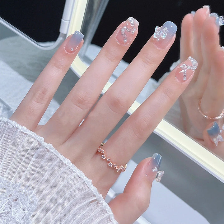Acrylic nail set with sparkling glitter elements and appealing ombre design Bowlift