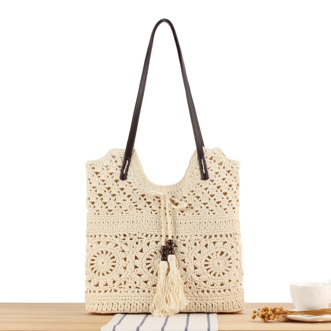 Handbag in Creative Macrame Design with Tassel Detail Bowlift