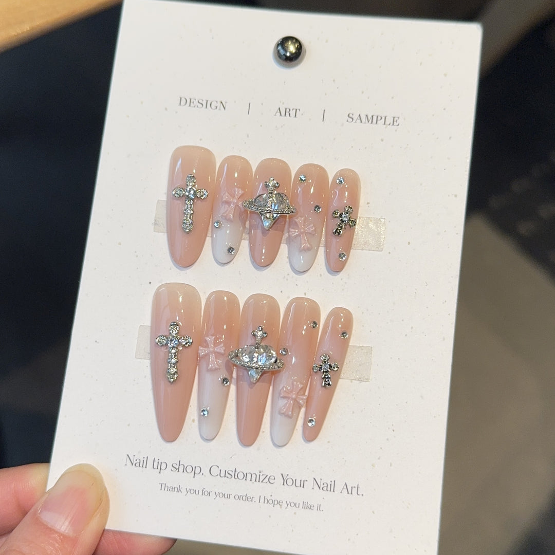 Acrylic nails with rhinestone embellished accents Bowlift