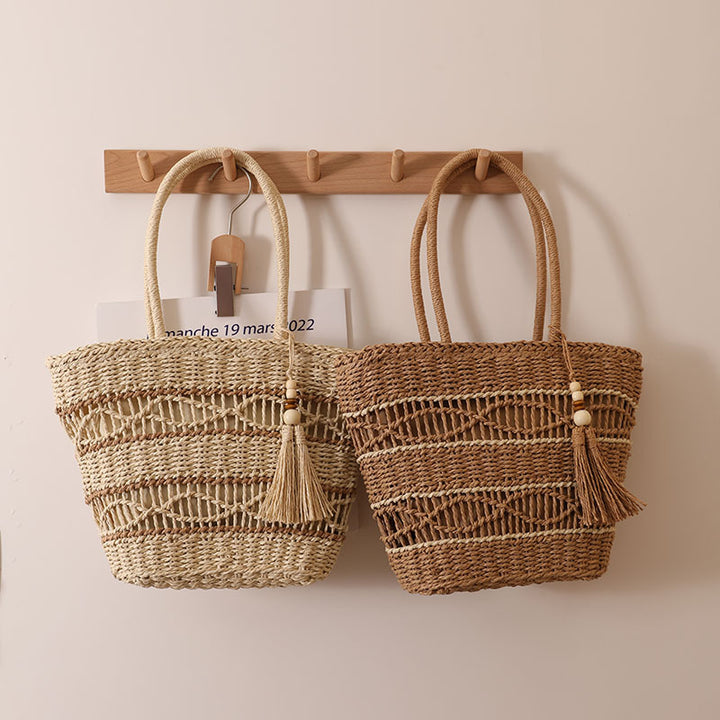 Handcrafted straw tote bag with decorative tassel detail Bowlift