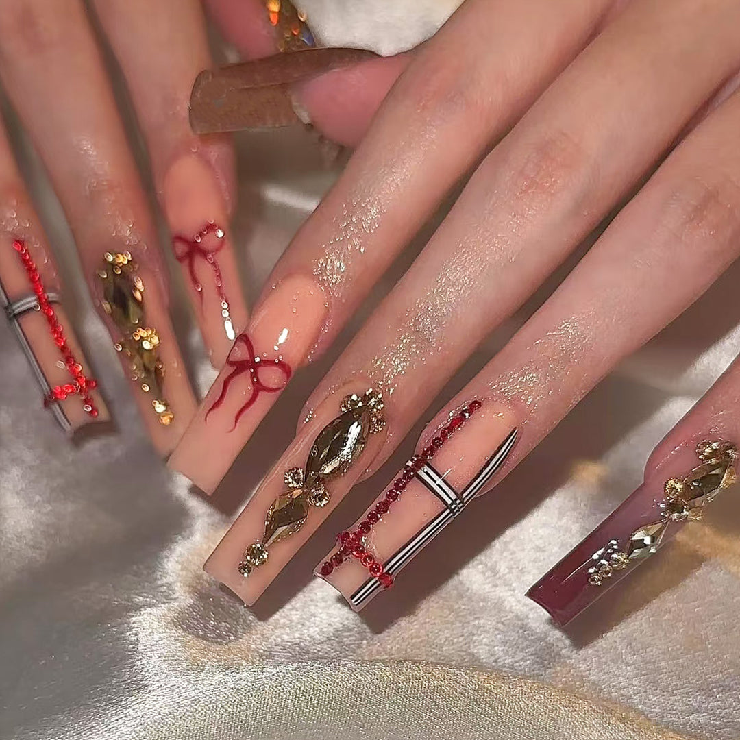 Decorative Long Press-On Nails with Artistic Gem Accents Bowlift