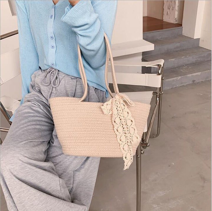 Handcrafted straw bag with lace accent Bowlift