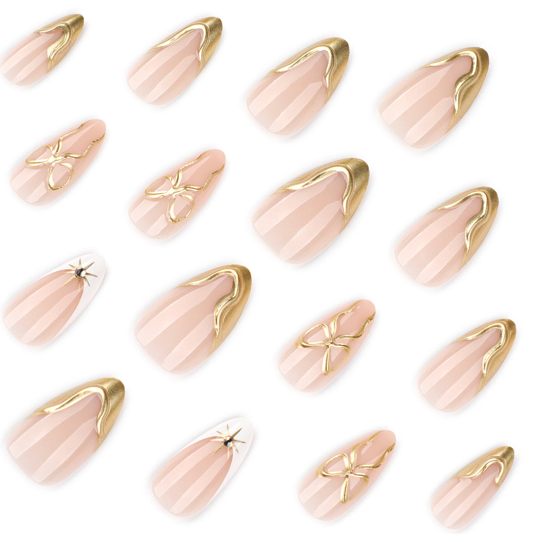 Artistic stiletto nails with elegant gold accents Bowlift