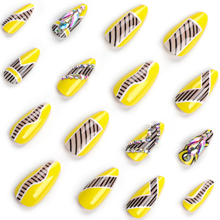 Artful nail extensions with geometric design and glitter accents Bowlift