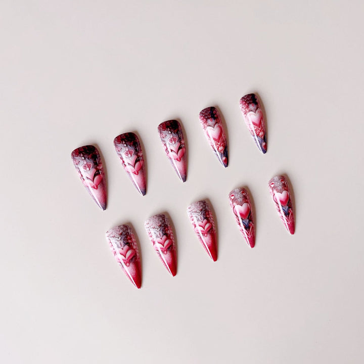 Artificial nail set with romantic 3D heart designs and luxurious embellishments Bowlift