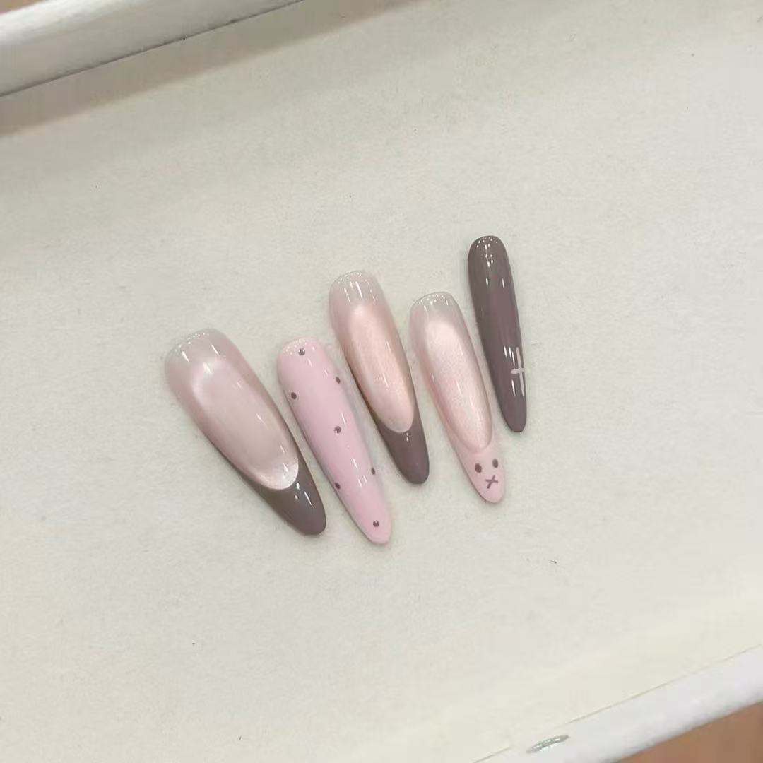 Artistic Long Stiletto Nail Enhancements Bowlift