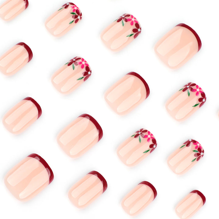 Artful nail design with flower and gradient effects Bowlift
