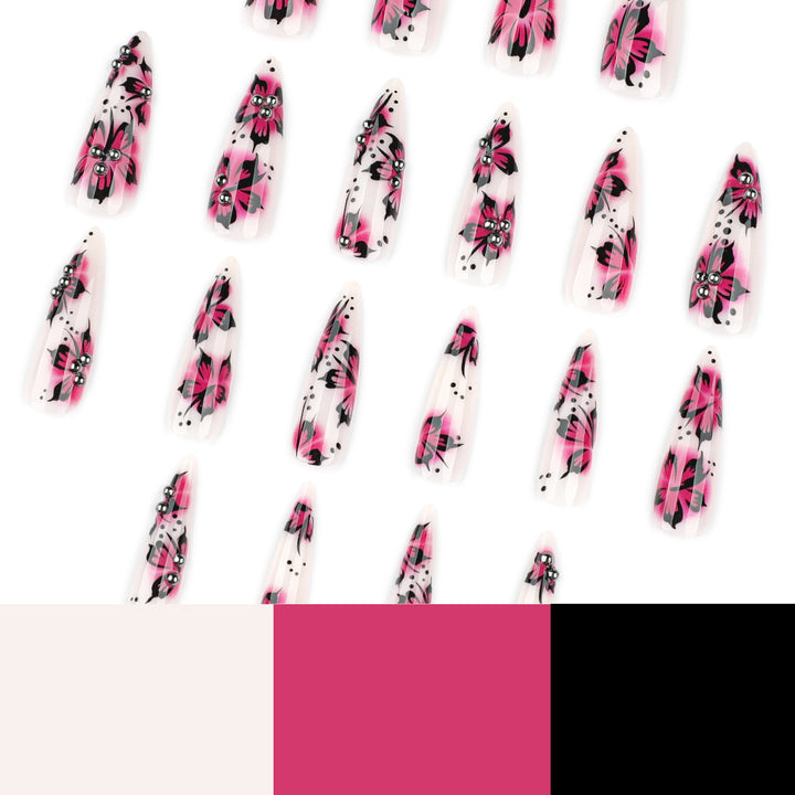 Artful nail art with floral design and rhinestone accents Bowlift