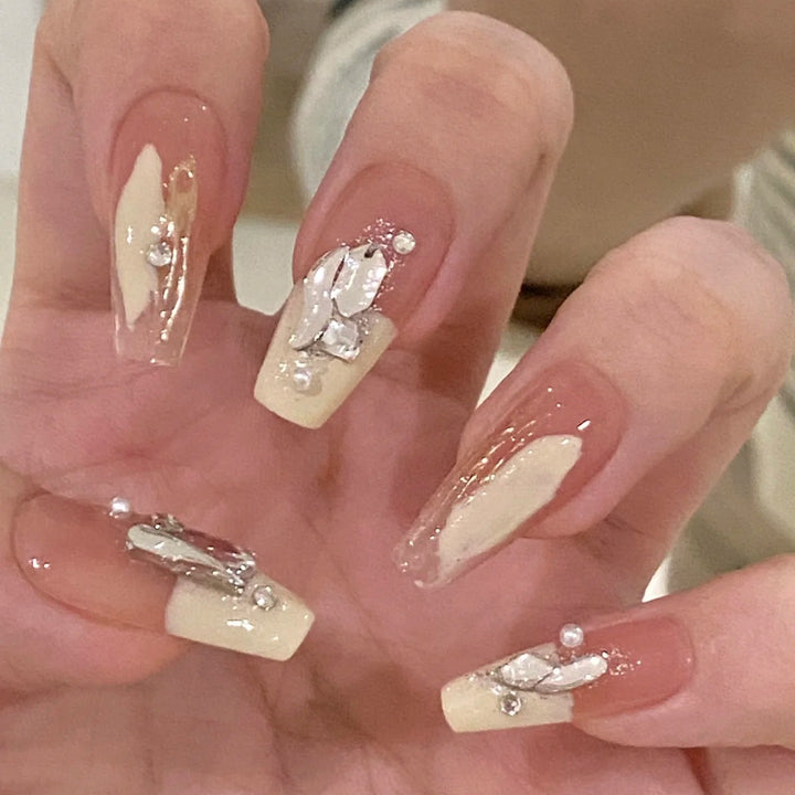 Glamorous artificial nails with heart design Bowlift