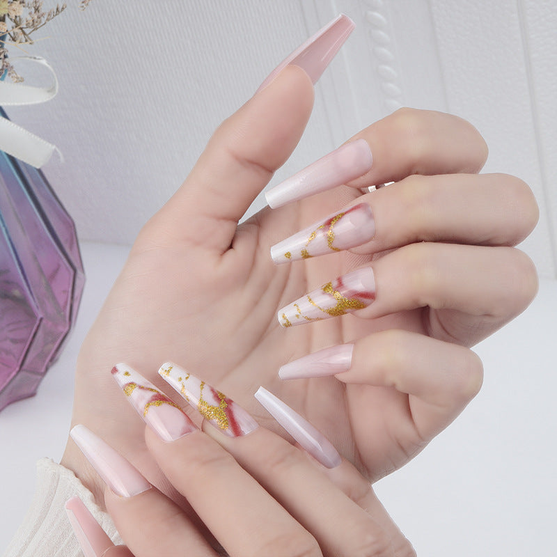 Elegant Long Stiletto Press-On Nails with Artistic Marble Design Bowlift