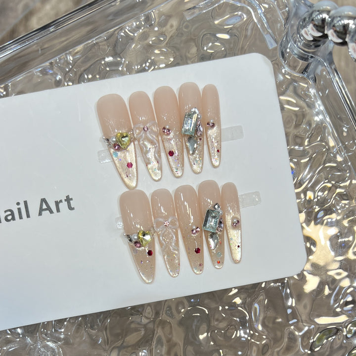 Elegant Stiletto Press-On Nail Set with Decorative Accents Bowlift