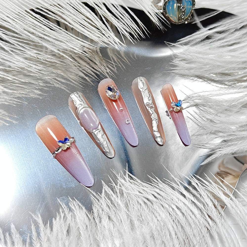 Artificial nails with elegant ombre design and jewelry accents Bowlift