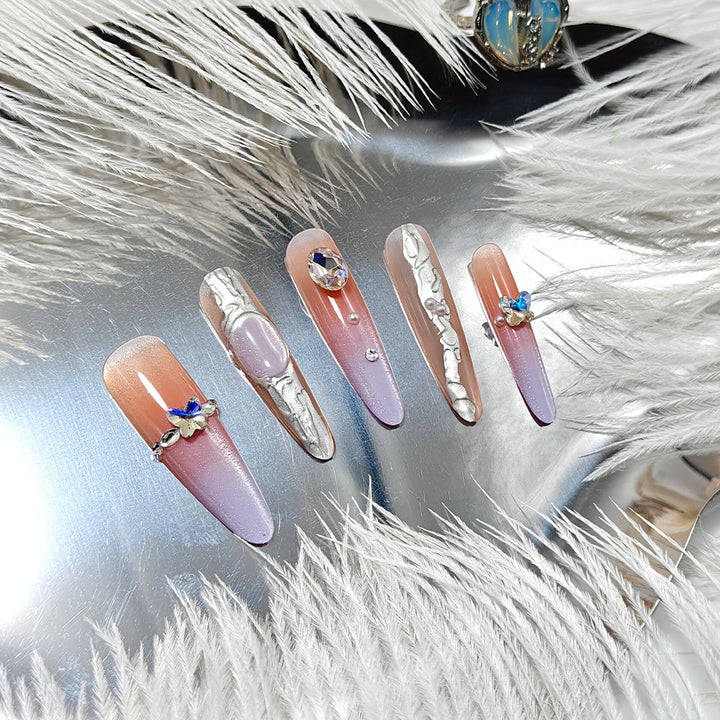 Artificial nails with elegant ombre design and jewelry accents Bowlift