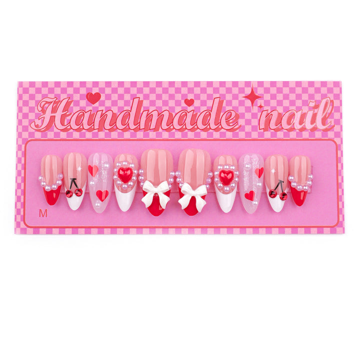 Artful Handmade Nail Art with Hearts and Ribbons Bowlift