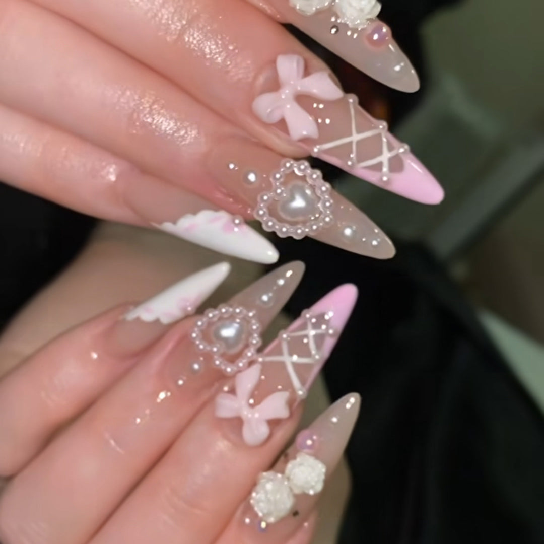 Artful stiletto nails with romantic accents Bowlift