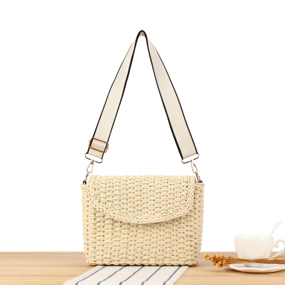 Handbag made of woven natural material with adjustable shoulder strap Bowlift