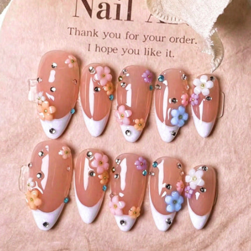 Artificial nail set with delicate floral decorations and sparkling rhinestones Bowlift