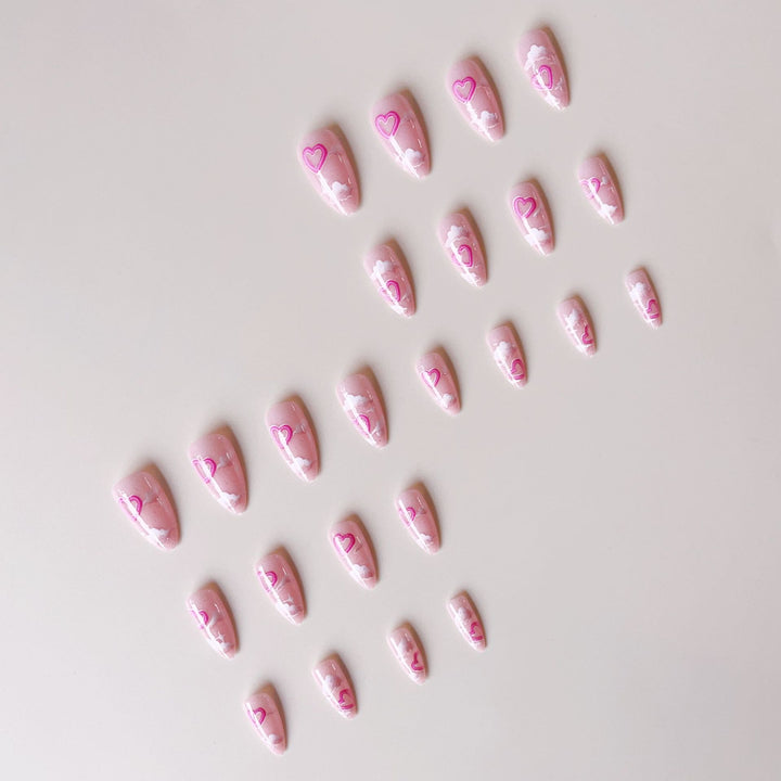 Artificial nail set with romantic heart accents and sparkling finish Bowlift