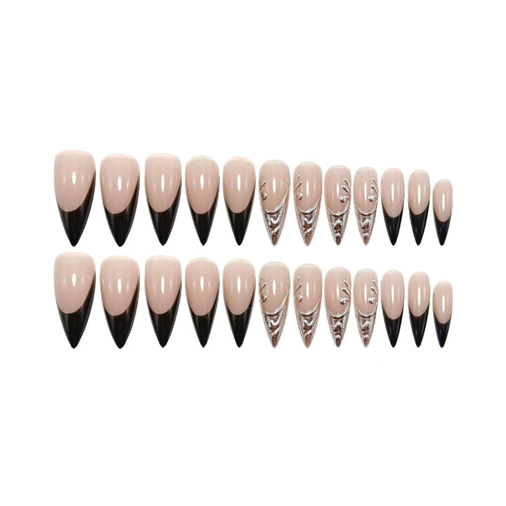 Artificial nails in elegant stiletto style with elaborate metal decoration Bowlift