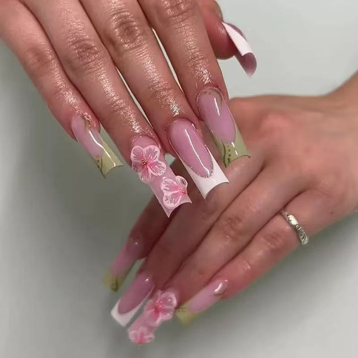 Artful nail tips with floral embellishments Bowlift