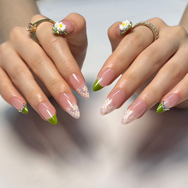 Artificial nails with floral accents and green French tip Bowlift