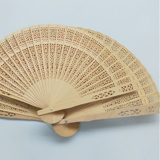 Ladies decorative and high-quality hand fan made of filigree wood Bowlift