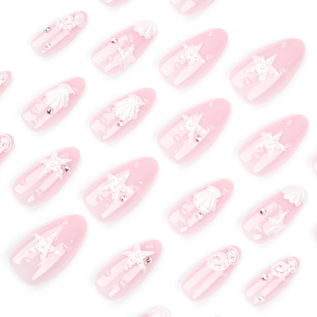 Artistic nail designs with shell and star motif Bowlift