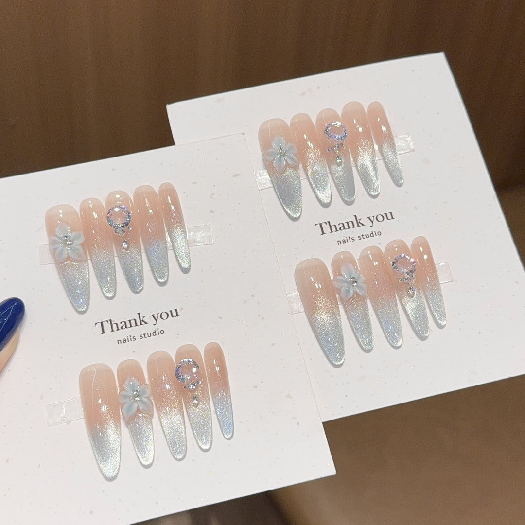 Artificial Nails Set with Shimmering Ombre Effect and Floral Accents Bowlift