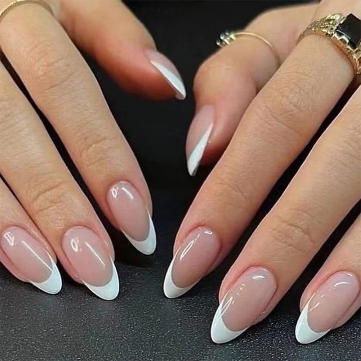 Artful stiletto nails with heart-shaped accents Bowlift