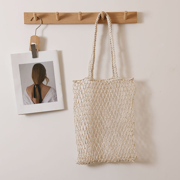 Net carry bag with ergonomic handles Bowlift