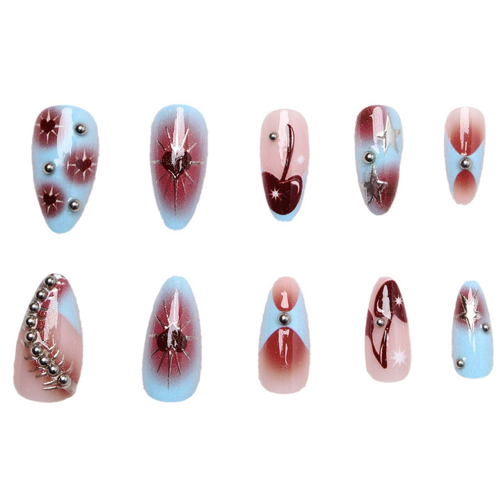 Creative nail art set with artistic color gradients and glitter embellishments Bowlift
