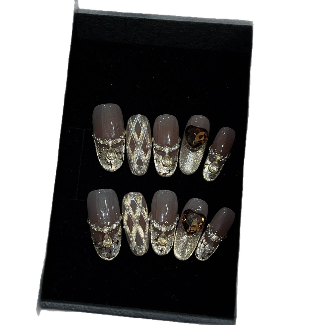 Glamorous artificial nails with glitter and heart design Bowlift