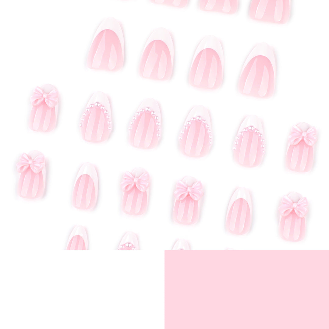 Artful Stiletto Nails with Delicate Bow Accents Bowlift