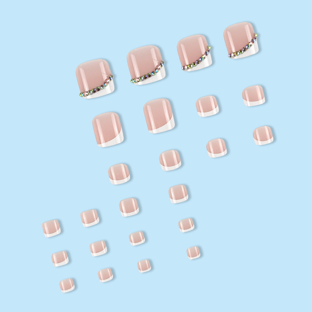 Nail art set with elegant French tips and glitter accents Bowlift