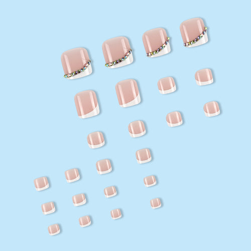 Nail art set with elegant French tips and glitter accents Bowlift