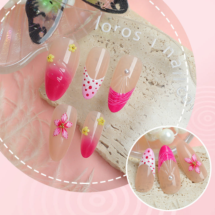 Artful nail tips with delicate floral embellishments Bowlift