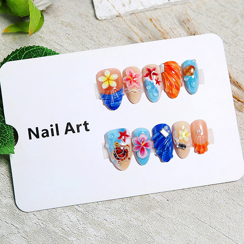 Artificial nails in maritime design with 3D embellishments Bowlift