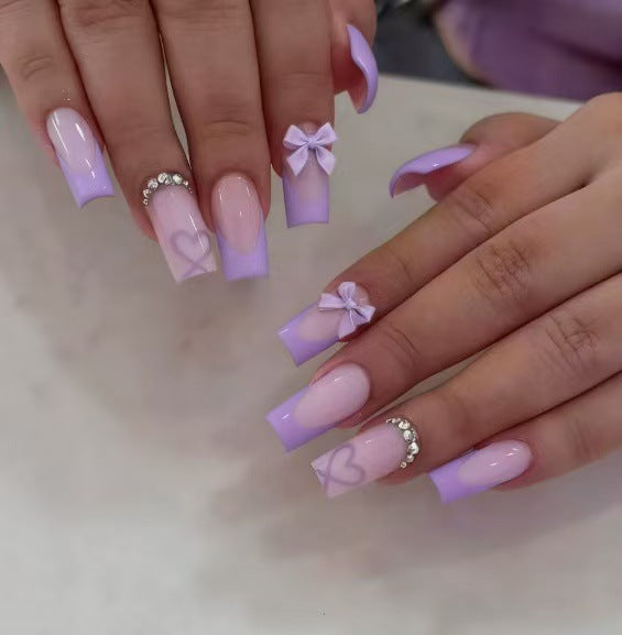 Artificial nail set with elegant 3D bows and glitter details Bowlift