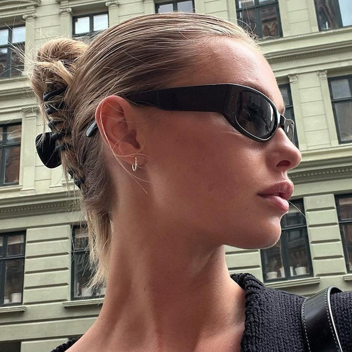 Women's sporty sunglasses with a wide frame and UV protection Bowlift