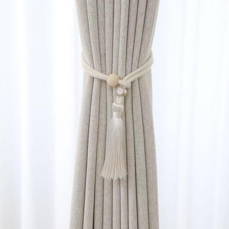Elegant curtain tieback with tassels Bowlift