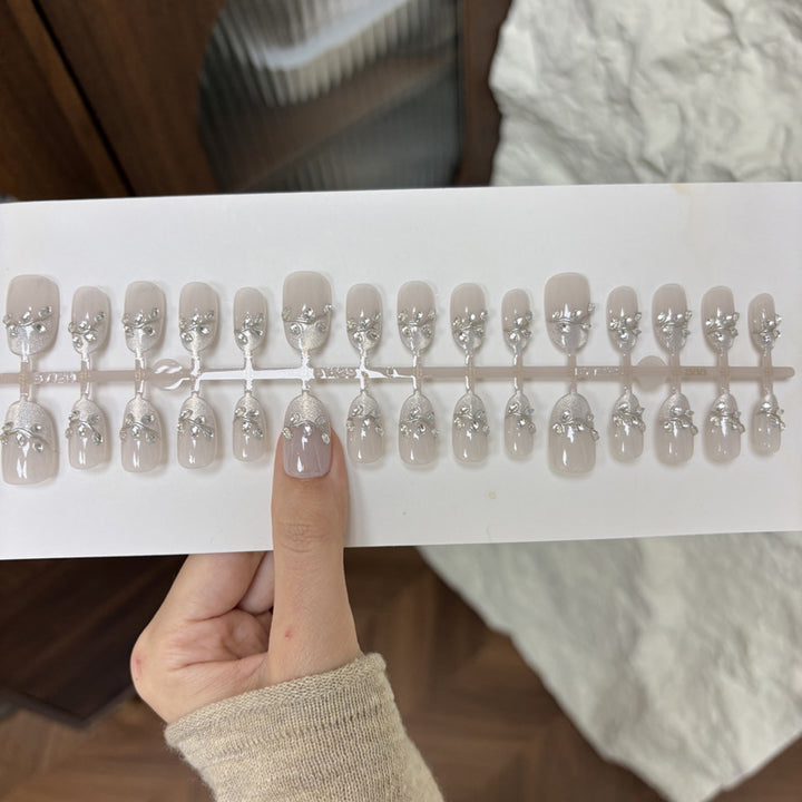 Elegant Press-On Nail Set with Decorative Rhinestone Accents Bowlift